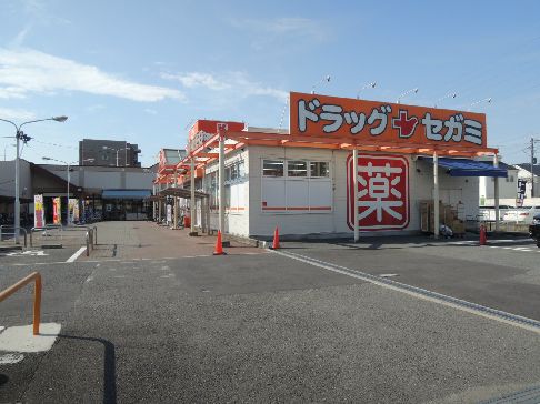 近くの関西スーパー　旭ヶ丘店まで128m（徒歩2分）