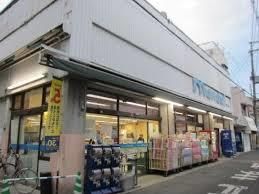 近くのヒグチ薬店チェーン 弥刀駅前店まで402m（徒歩6分）