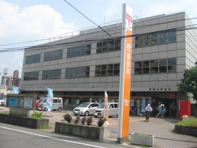 近くの寝屋川郵便局まで450m（徒歩6分）
