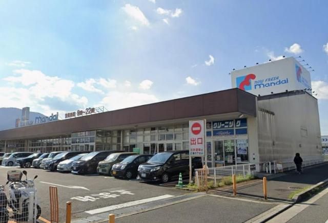近くの万代香芝二上店まで628m（徒歩8分）