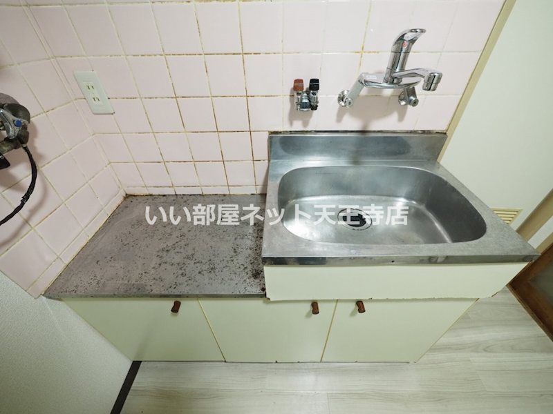 近くのファミリーマート 駒川中野東店まで154m（徒歩2分）