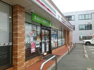 近くのセブンイレブン柏原国分店様まで490m(徒歩7分)