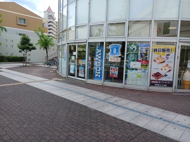 近くのローソン住道駅前店様まで450m（徒歩6分）
