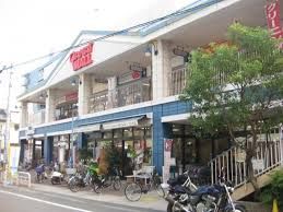 近くのデイリーカナートイズミヤ 桑津店まで507m（徒歩7分）