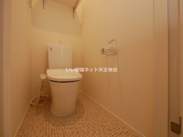 近くのファミリーマート 天王寺堀越町店まで196m（徒歩3分）