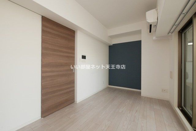 近くのファミリーマート 桑津五丁目店まで490m(徒歩7分)