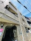 サンプラザ照ヶ丘A棟の外観