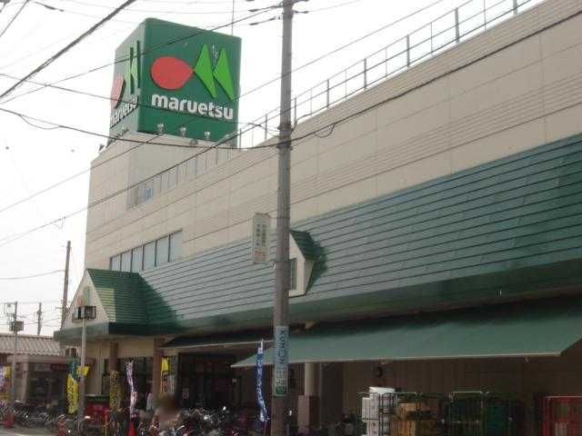 近くのマルエツ東門前店まで965m（徒歩13分）