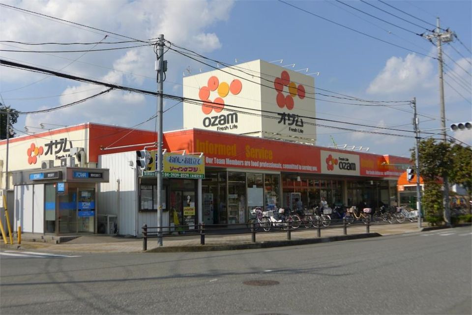 近くのスーパーオザム東狭山ヶ丘店まで407m（徒歩6分）