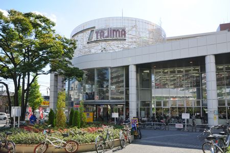 近くのタジマ王子店まで90m(徒歩2分)