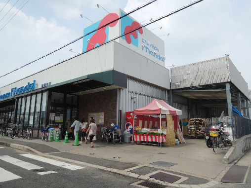 近くの万代 楽音寺店まで911m(徒歩12分)