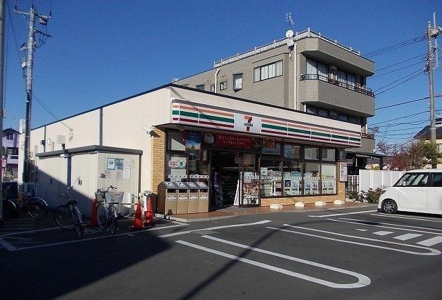 近くのセブンイレブン飯田岡店まで450m（徒歩6分）