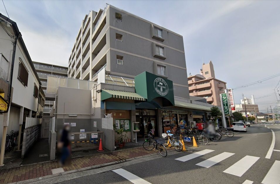 近くの南塚口センターセブンまで285m（徒歩4分）