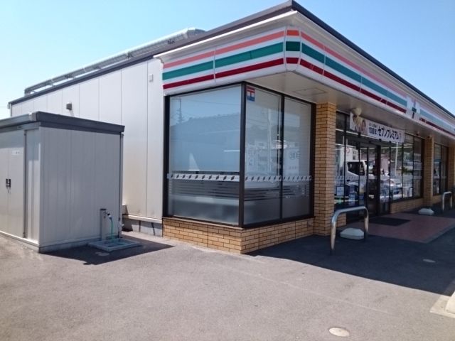 近くのセブンイレブン松山北吉田店様まで140m（徒歩2分）