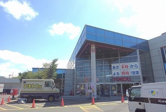 近くの東光ストアまで1,050m（徒歩14分）