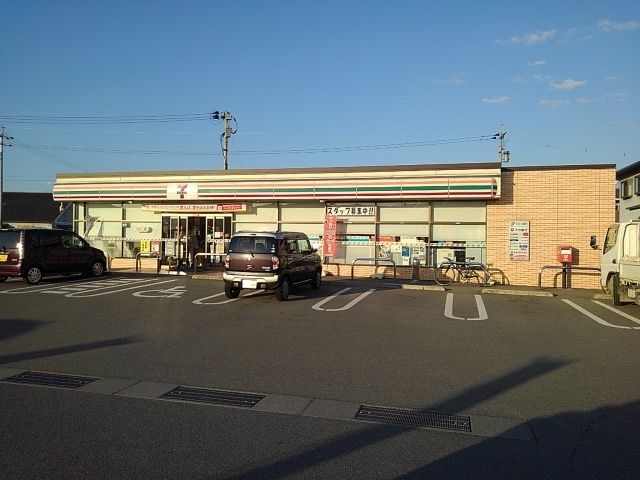 近くのセブンイレブン日田庄手店まで450m(徒歩6分)