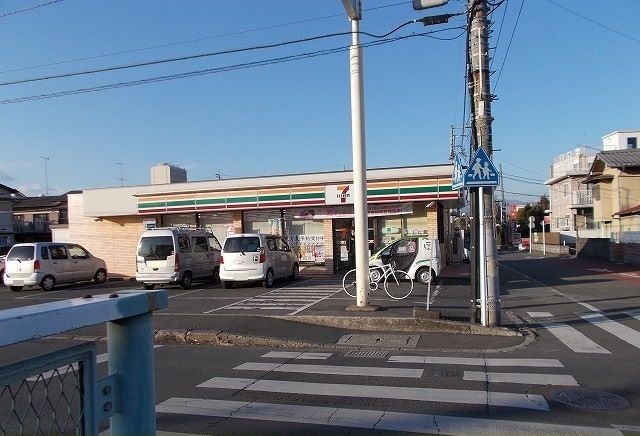 近くのセブンイレブン久野店まで450m（徒歩6分）