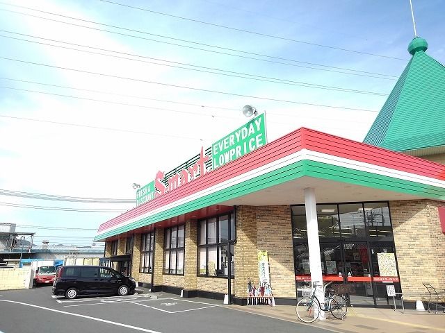 近くのエスマート吉成店まで1,100m（徒歩14分）