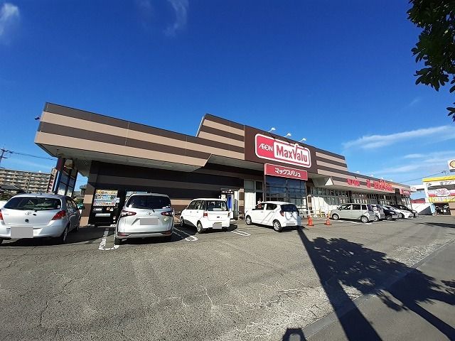 近くのマックスバリュ　坂ノ市店まで1,100m（徒歩14分）