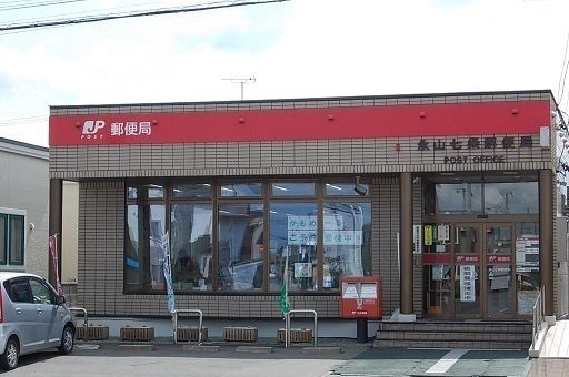 近くの永山七条郵便局まで900m（徒歩12分）