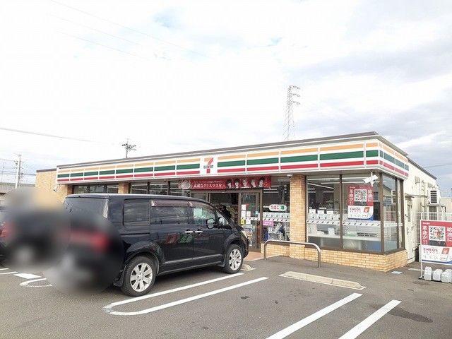 近くのセブンイレブン　上小口店まで450m（徒歩6分）