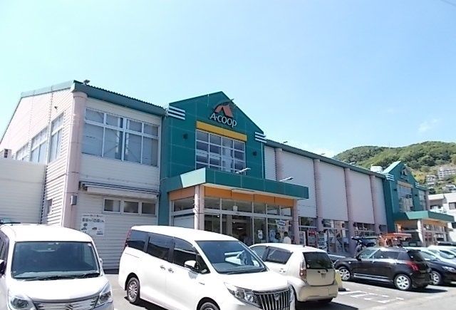 近くのＡコープゆがわら店まで700m（徒歩9分）
