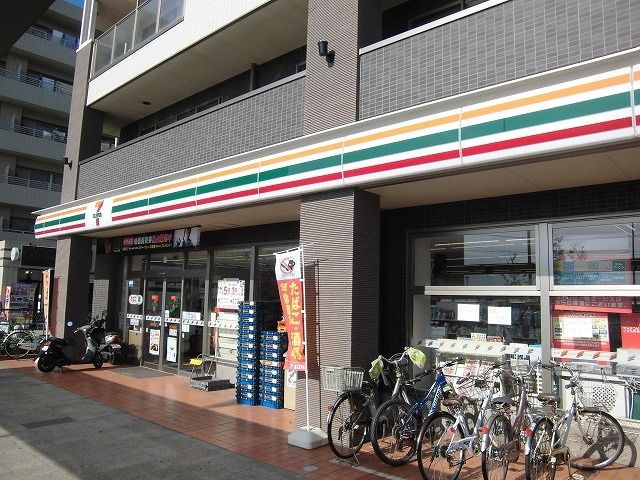 近くのセブンイレブン飯山満駅前店まで450m（徒歩6分）