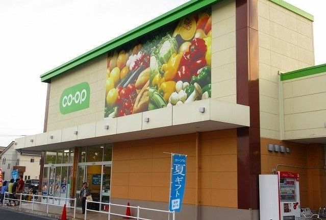 近くのコープまで1,100m（徒歩14分）