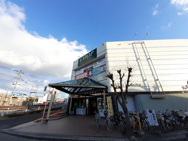 近くのみやぎ生協 黒松店まで450m（徒歩6分）