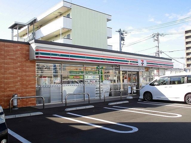 近くのセブンイレブン春日2丁目店まで450m（徒歩6分）