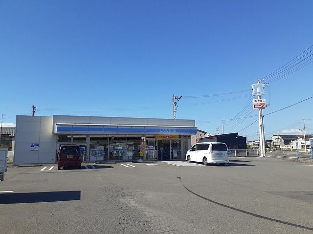 近くのローソン伊予インター店様まで700m（徒歩9分）