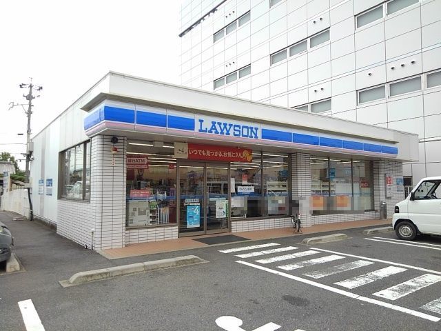 近くのローソン堀木店まで500m（徒歩7分）