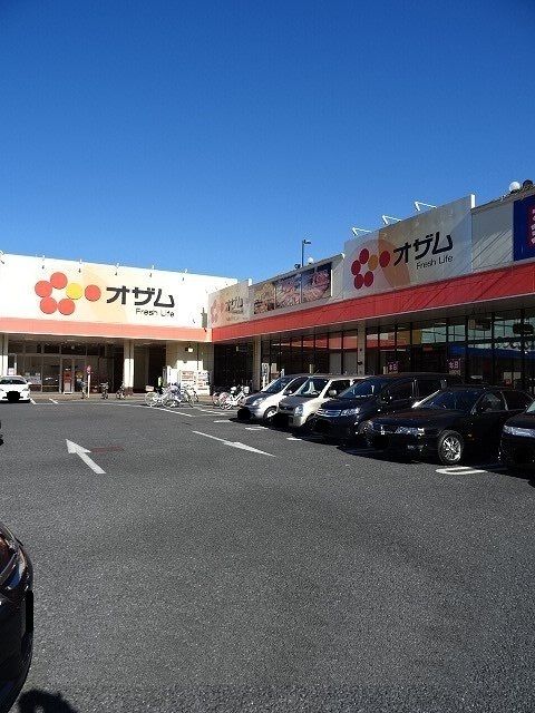 近くのオザムラーレ青梅新町店まで550m（徒歩7分）