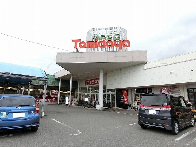 近くのトミダヤ神戸店まで450m(徒歩6分)
