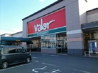 近くのバロー豊川店様まで690m（徒歩9分）