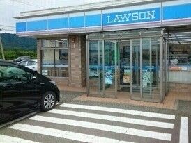 近くのローソン荒川十文字店まで550m（徒歩7分）