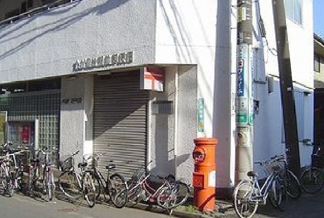 近くのたかの台駅前郵便局まで700m（徒歩9分）