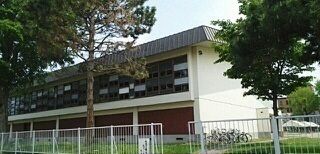 近くの旭川市立日章小学校まで600m（徒歩8分）