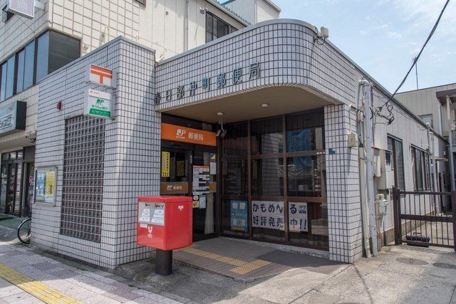 近くの春日部仲町郵便局まで880m(徒歩11分)