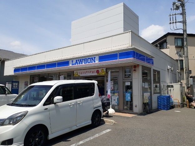 近くのローソン船橋塚田駅前店まで550m（徒歩7分）