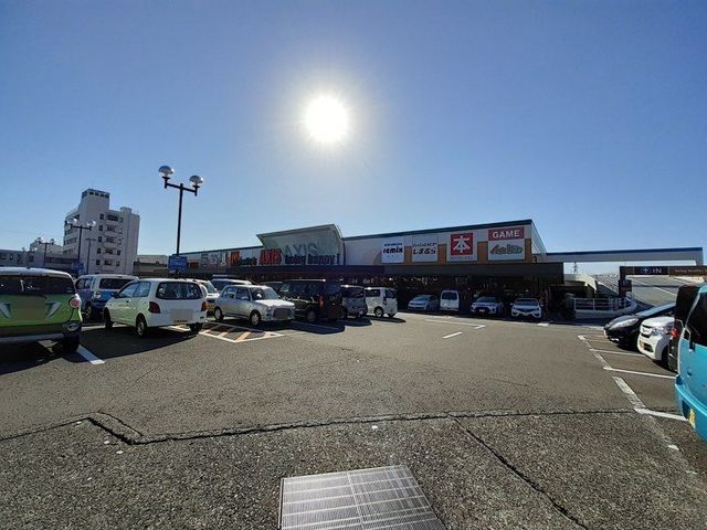 近くのサニーアクシス 南国店まで600m（徒歩8分）