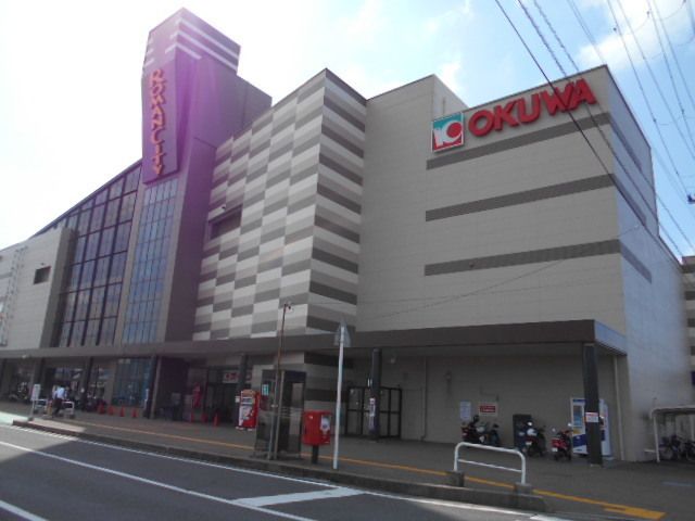 近くのオークワロマンシティ様まで1,100m(徒歩14分)