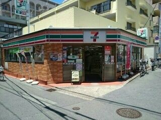 近くのセブンイレブン香里南之町店様まで650m（徒歩9分）