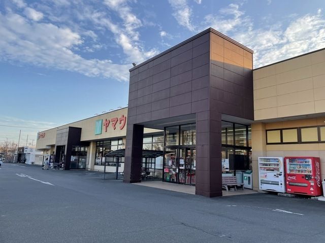 近くのスーパーヤマウチ神立店まで450m（徒歩6分）