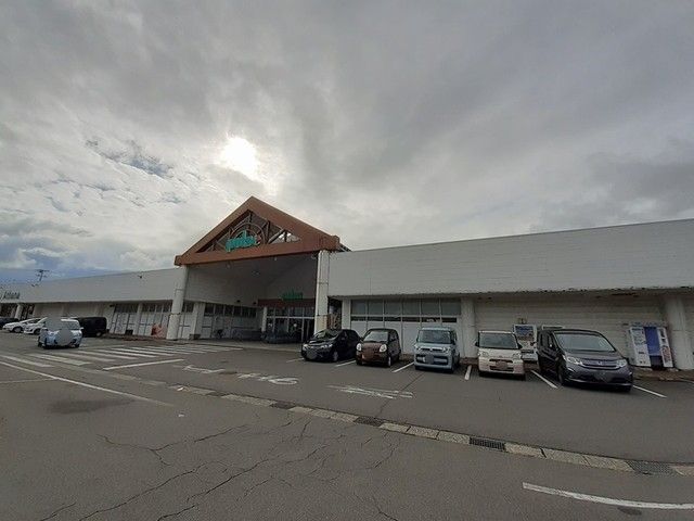近くのにいつフードセンターパルス店まで1,100m(徒歩14分)