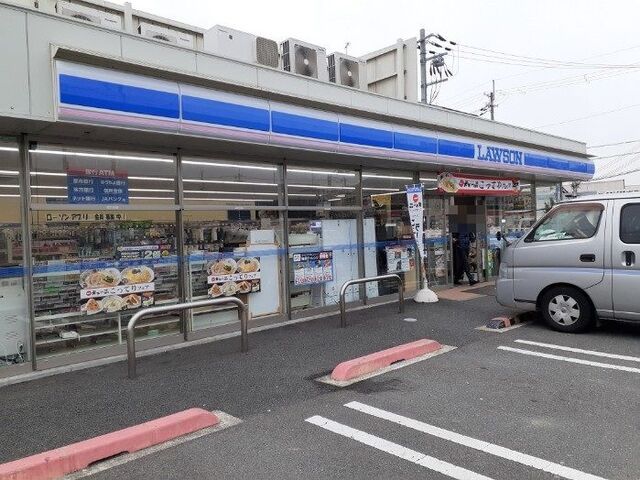 近くのローソン 国道西野店まで550m(徒歩7分)