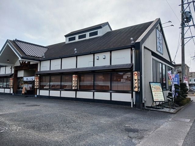 近くのかつ政　竜南店まで500m（徒歩7分）