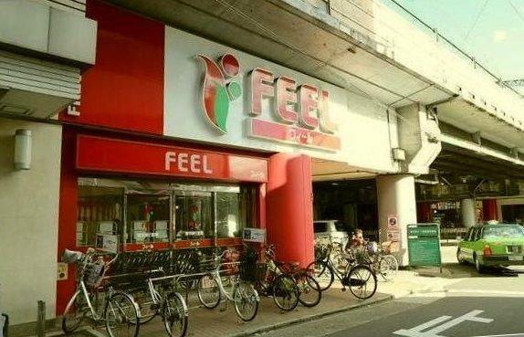 近くのフィール栄生店まで500m（徒歩7分）