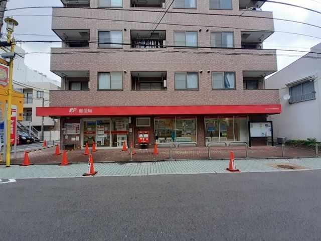 近くの足立竹の塚郵便局まで440m（徒歩6分）