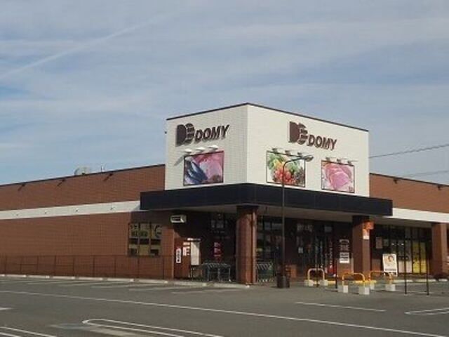 近くのドミー 丁田店まで500m（徒歩7分）